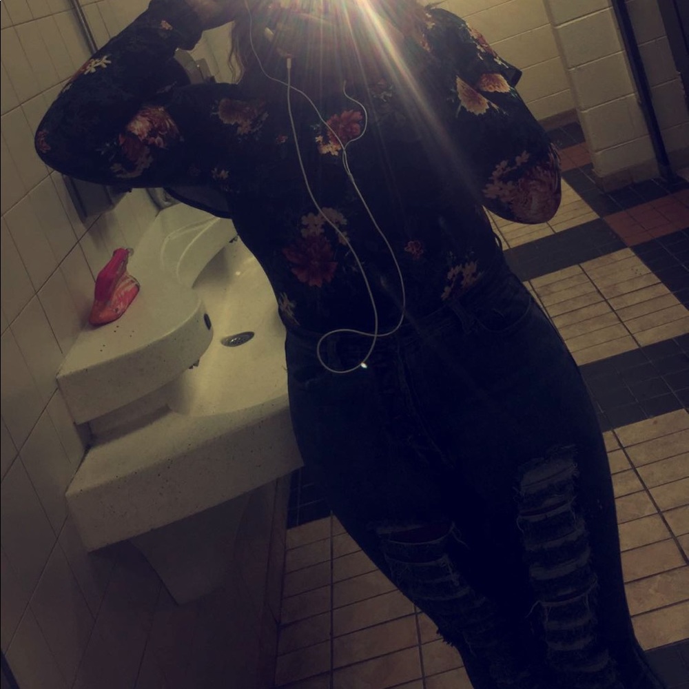 A black off the shoulder bodysuit